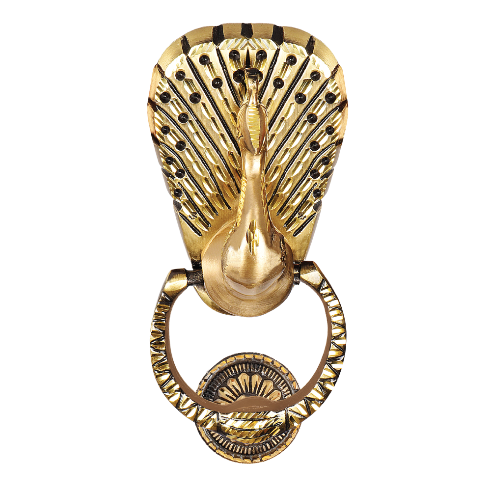 A gold-colored brass door knocker featuring an intricate peacock feather design, with a visible hinge and strike plate.