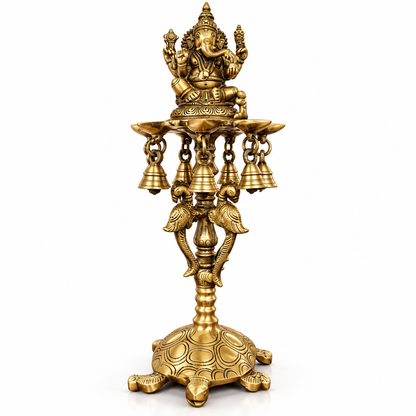 Brass Ganesh Diya Stand with 7 Oil Holders | Antique Finish Pooja Lamp with Hanging Bells, Peacock Design & Tortoise Base for Home Temple, Decor & Gifting | The Indian Aura