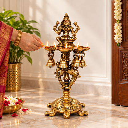 Brass Laxmi Diya Stand with 7 Oil Holders | Antique Finish Pooja Lamp with Hanging Bells, Peacock Design & Tortoise Base for Home Temple, Decor & Gifting | The Indian Aura
