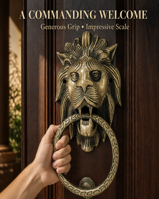 A bronze lion head door knocker with a matching ring pull, shown being held by a hand against a dark wooden door. Text at the top reads 'A COMMANDING WELCOME' and 'Generous Grip • Impressive Scale'.
