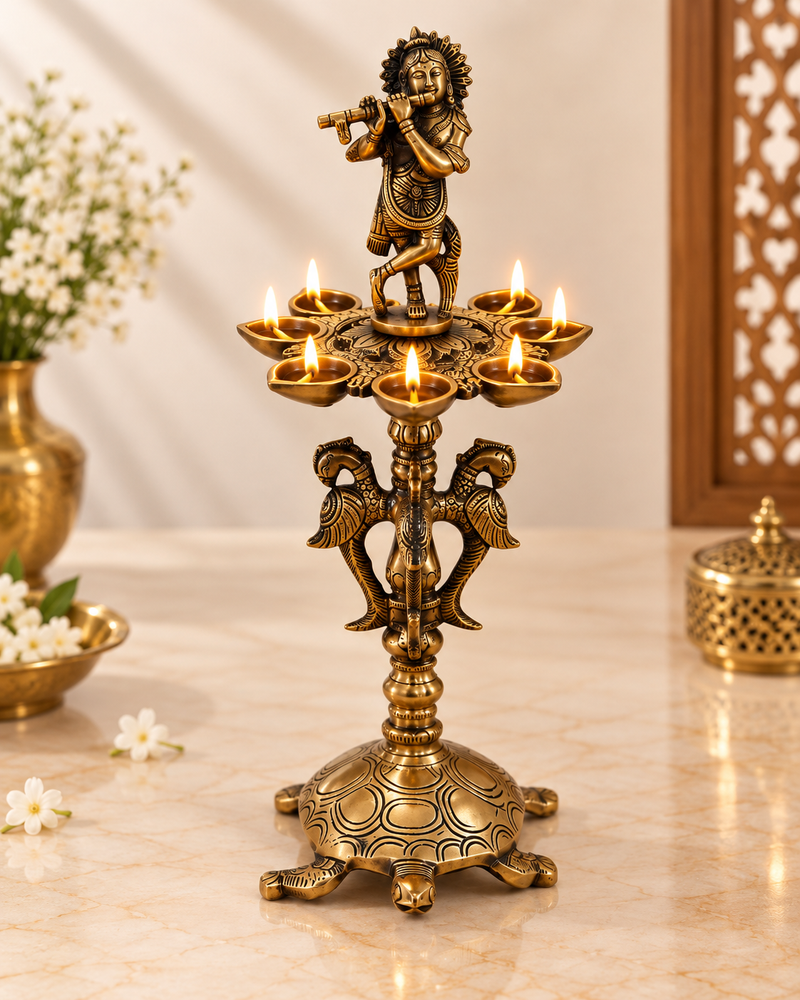 Brass Krishna Diya Stand with 7 Oil Holders – Antique Finish | The Indian Aura