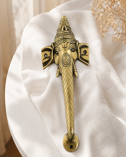 Decorative ganesha brass door handle.