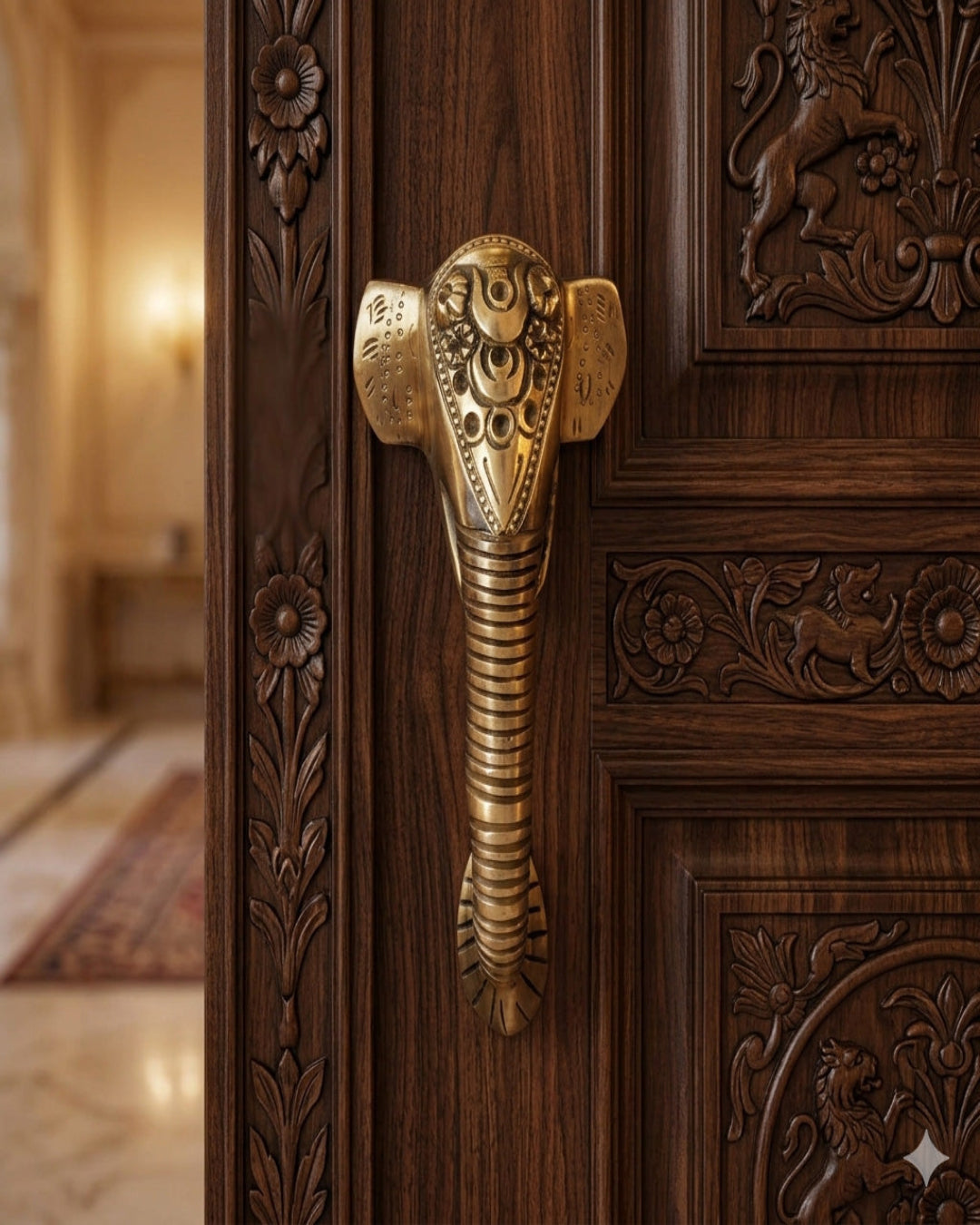 Decorative brass handle on a wooden door.