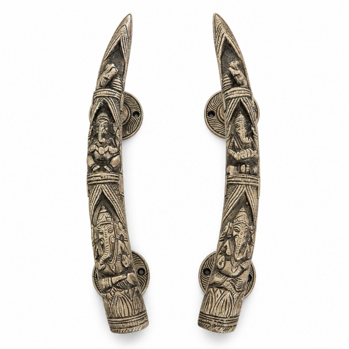 A pair of ornate silver-toned metal door handles featuring detailed carvings of Hindu deities, set against a plain white background.