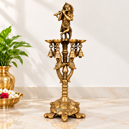 Brass Krishna Diya Stand with 7 Oil Holders – Antique Finish | The Indian Aura