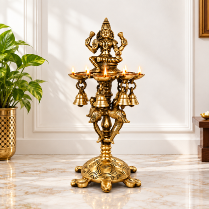 Brass Laxmi Diya Stand with 7 Oil Holders | Antique Finish Pooja Lamp with Hanging Bells, Peacock Design & Tortoise Base for Home Temple, Decor & Gifting | The Indian Aura